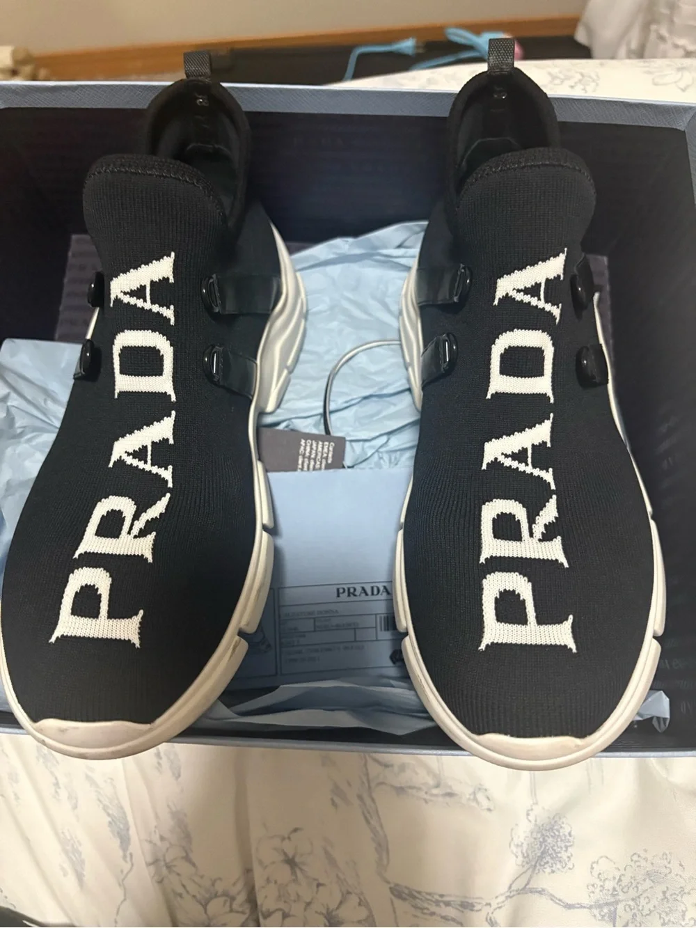Prada womens Black Logo Knit Slip-On Sneakers
